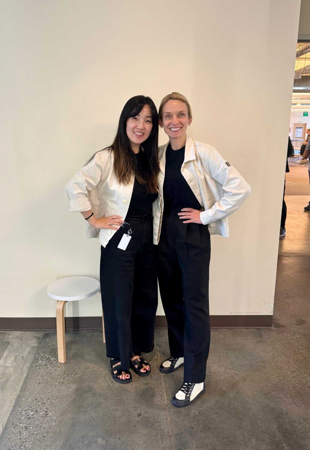 Hillary and Amy wearing identical outfits